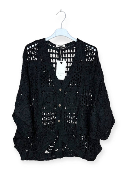 Virkad väst med genombrutna geometriska mönster - flera färger